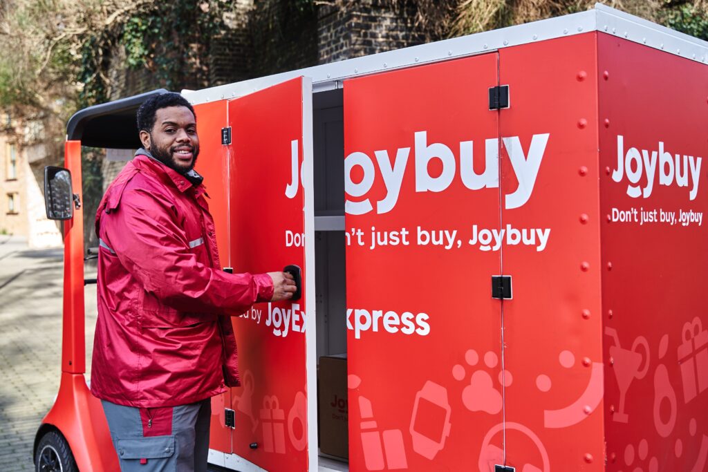 JoyExpress Courier Opens Cargo Hold Of Bike